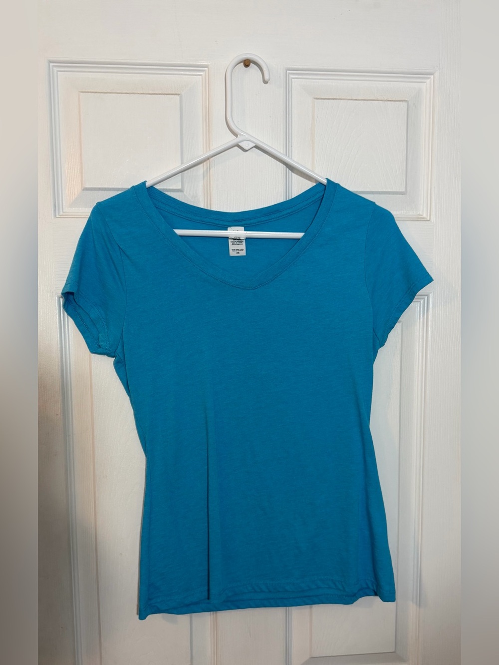 District Women's Short Sleeve V-Neck Tee in Teal Blue